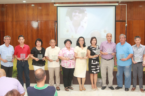 Service Awardees receive their plaques.