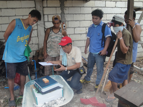 FPRDI’s Engr. Ruben Zamora explains to workers the procedures for operating the furnace-type lumber dryer.