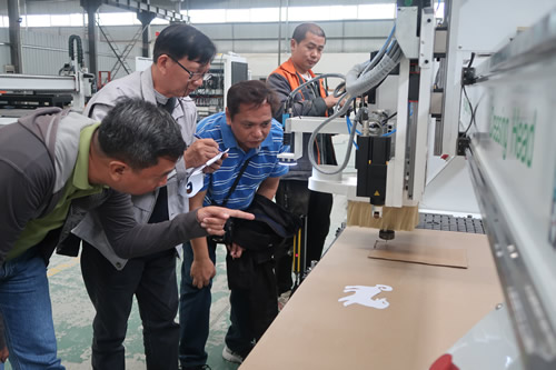 FPRDI researchers train on CNC use.