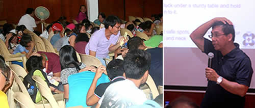 Dir. Solidum teaches FPRDI employees how to 'drop, cover and hold' in case of a strong earthquake.