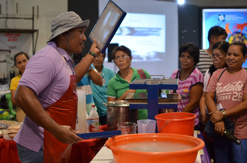 Mr. Justino Buendia on his demonstration of handmade paper making.